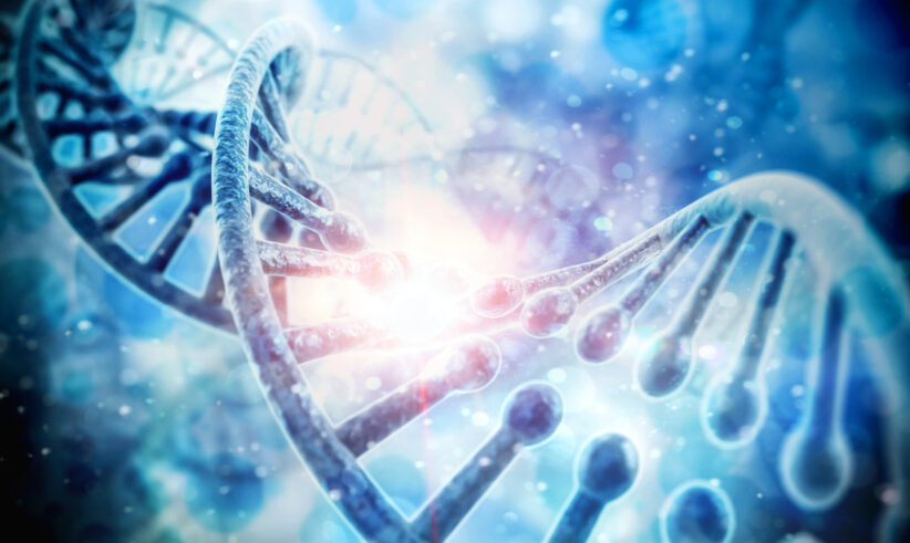 Close-up illustration of a DNA double helix with a glowing light effect in the center, set against a blue abstract background, representing genetics or biotechnology.