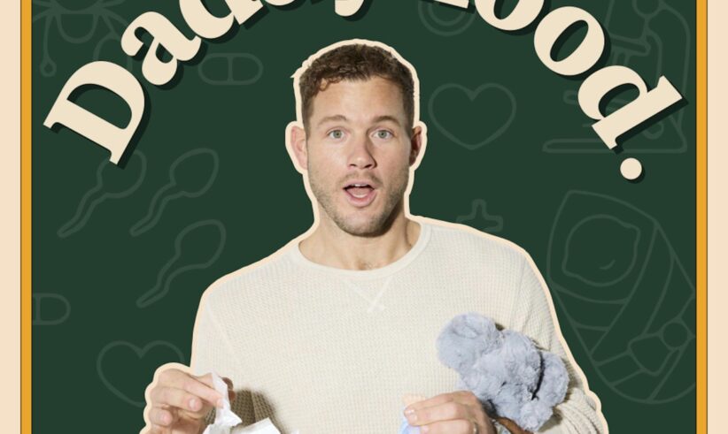 A surprised man in a cream sweater holds a diaper and a plush toy. The word “Daddyhood.” curves above him. The background features line drawings of baby items. Text below reads, “with Colton Underwood.”.