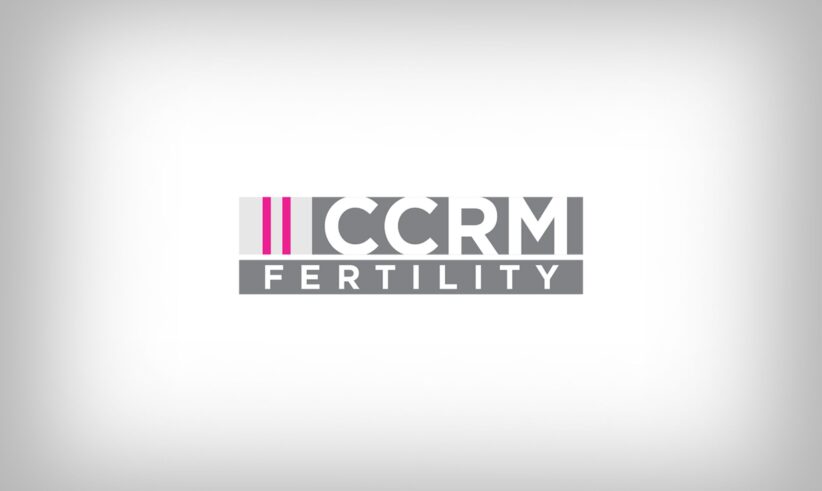 Logo for CCRM Fertility. The background is white with a faint gray gradient, and the logo features CCRM in bold gray letters above FERTILITY in white letters inside a gray box, with two vertical magenta lines to the left.