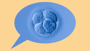 A blue-toned image of a cell cluster, possibly a human embryo at early stages, appears inside a speech bubble on a beige background.