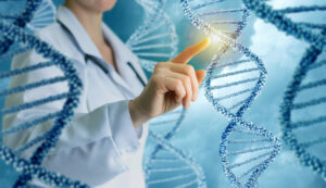A person in a lab coat touches a glowing spot on a digital DNA double helix, surrounded by several other DNA strands against a blue background, symbolizing genetic research or biotechnology.