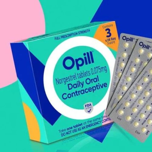 A box of Opill Daily Oral Contraceptive is shown next to three blister packs of pills, set against a colorful pink, blue, and green background.
